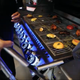 Illustration for article titled Only the sickest brats: McCormick’s new grill doubles as DJ station